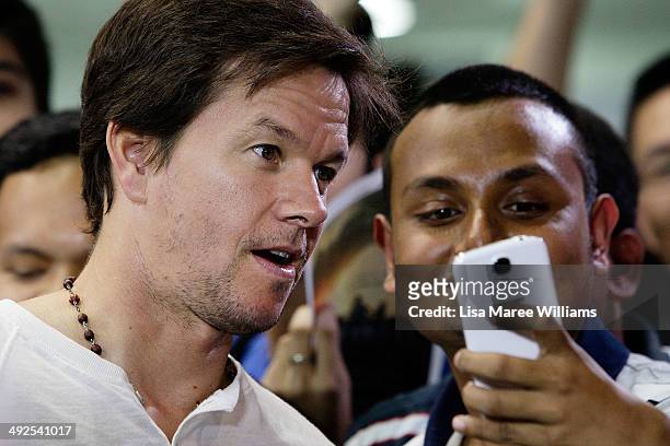 Mark Wahlberg poses with fans at the 'Transformers - Age Of Extinction' footage screening at Event Cinemas George Street on May 21, 2014 in Sydney,...