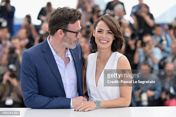 Director Michel Hazanavicius and actress Berenice Bejo attend "The Search" photocall at the 67th Annual Cannes Film Festival on May 21, 2014 in...