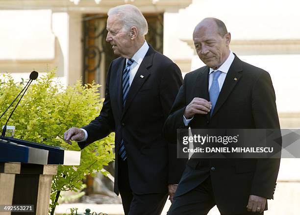 Vice President Joe Biden and Romanian President Traian Basescu arrive for delivering a speech at the Cotroceni Palace, the Romanian Presidency...