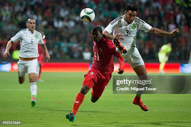 Arturo Rivas of Mexico fights for the ball with Armando Cooper of Panama during the International Friendly match between Mexico and Panama at Nemesio...