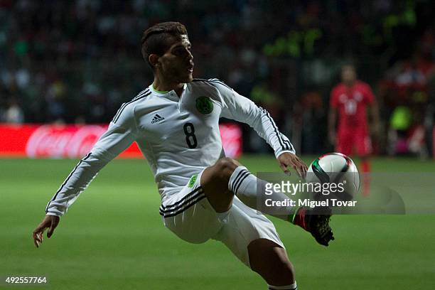 Jonathan Dos Santos of Mexico passes the ball during the International Friendly match between Mexico and Panama at Nemesio Diez Stadium on October...