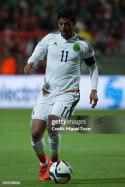 Carlos Vela of Mexico drives the ball during the International Friendly match between Mexico and Panama at Nemesio Diez Stadium on October 13, 2015...