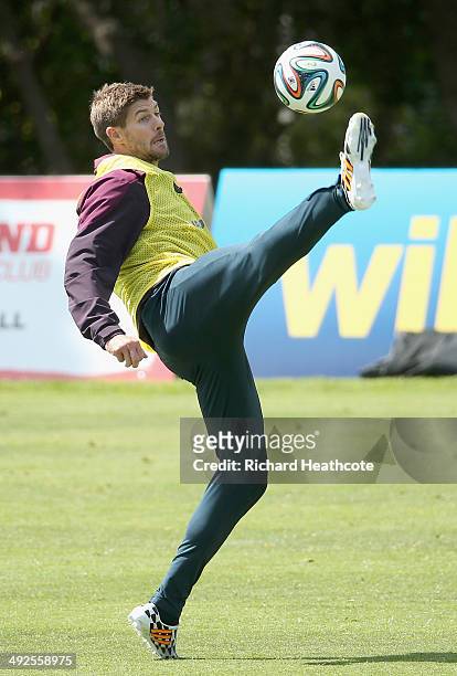 Steven Gerrard controls the ball during a training session at the England pre-World Cup Training Camp at the Vale Do Lobo Resort on May 21, 2014 in...