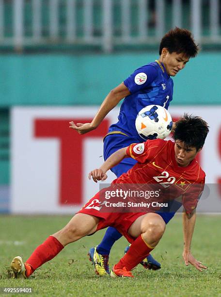 Natthakarn Chinwong of Thailand tackles Le Thu Thanh Huong of Vietnam during the AFC Women's Asian Cup 5th and 6th placing match between Vietnam and...