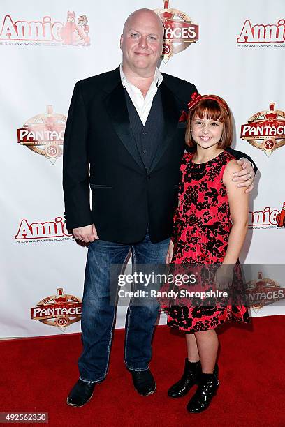 Actor Gilgamesh Taggett and actress Issie Swickle attend the premiere of "Annie" at the Hollywood Pantages Theatre on October 13, 2015 in Hollywood,...