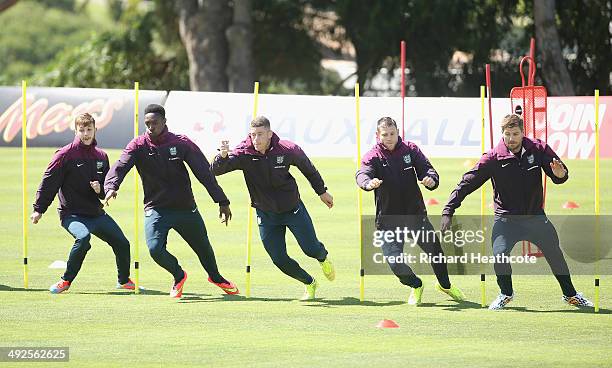 Adam Lallana, Danny Welbeck, Ross Barkley, James Milner and Steven Gerrard in action during a training session at the England pre-World Cup Training...