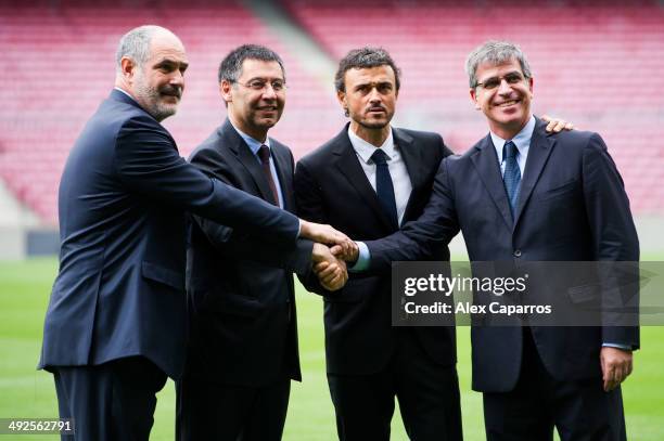 Luis Enrique Martinez poses with Sports Director Andoni Zubizarreta, President Josep Maria Bartomeu and Vice President Jordi Mestre during his...