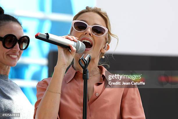 Kylie Minogue performs at Le Grand Journal television show on the Martinez Hotel beach on day 7 of the 67th Annual Cannes Film Festival on May 20,...