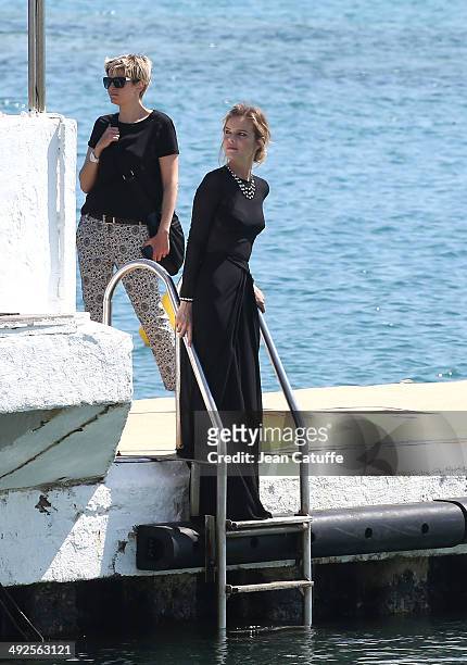 Model Eva Herzigova poses during a photo shoot at the Martinez Hotel beach on day 7 of the 67th Annual Cannes Film Festival on May 20, 2014 in...