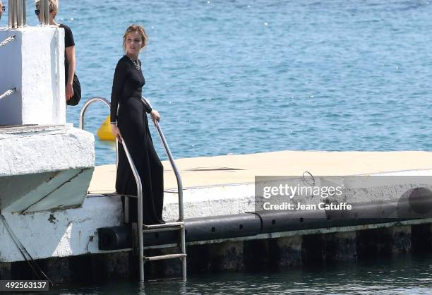 Model Eva Herzigova poses during a photo shoot at the Martinez Hotel beach on day 7 of the 67th Annual Cannes Film Festival on May 20, 2014 in...