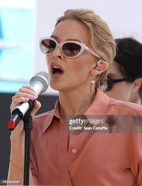 Kylie Minogue performs at Le Grand Journal television show on the Martinez Hotel beach on day 7 of the 67th Annual Cannes Film Festival on May 20,...