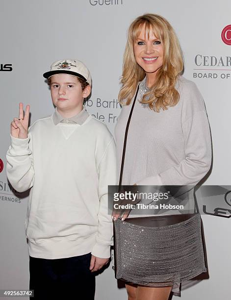 Smokey Child and Joan Dangerfield attend the Cedars-Sinai Board of Governors Gala at The Beverly Hilton Hotel on October 13, 2015 in Beverly Hills,...