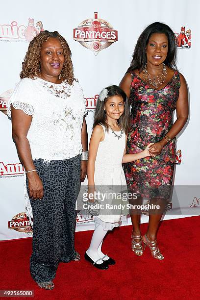 Actress CCH Pounder , actress Lorraine Toussaint and her daughter Samara Grace attend the premiere of "Annie" at the Hollywood Pantages Theatre on...