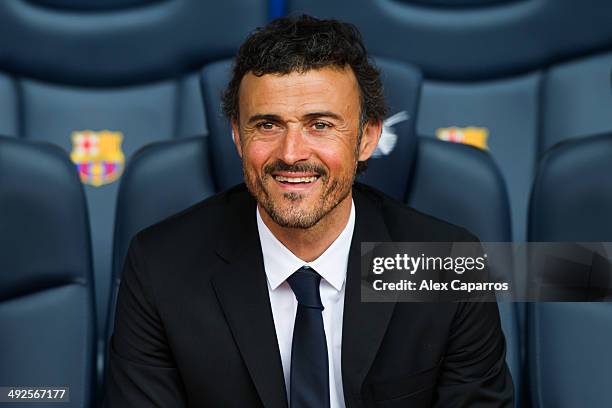 Luis Enrique Martinez poses for the media during his official presentation as the new coach of FC Barcelona at Camp Nou on May 21, 2014 in Barcelona,...