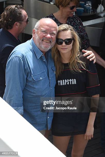 Cara Delevingne and Peter Lindbergh are seen on day 8 of the 67th Annual Cannes Film Festival on May 21, 2014 in Cannes, France.