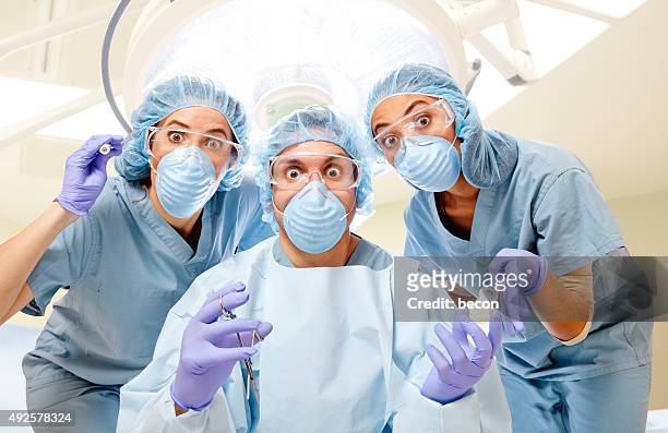 operationssaal chirurgie - funny surgical masks stock-fotos und bilder
