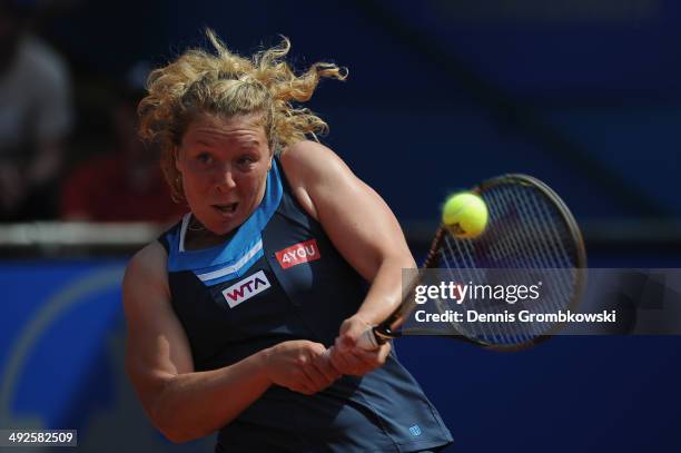 Anna-Lena Friedsam of Germany plays a backhand during her match against Angelique Kerber of Germany during Day 5 of the Nuernberger Versicherungscup...