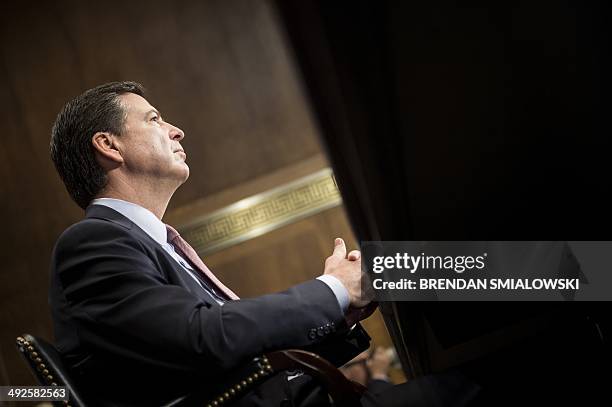 Federal Bureau of Investigation Director James Comey testifies during a hearing of the Senate Judiciary Committee on Capitol Hill May 21, 2014 in...