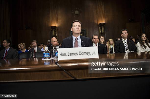 Federal Bureau of Investigation Director James Comey testifies during a hearing of the Senate Judiciary Committee on Capitol Hill May 21, 2014 in...