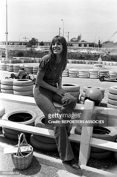 Singer Jane Birkin on a karting racing circuit in France, circa 1970.