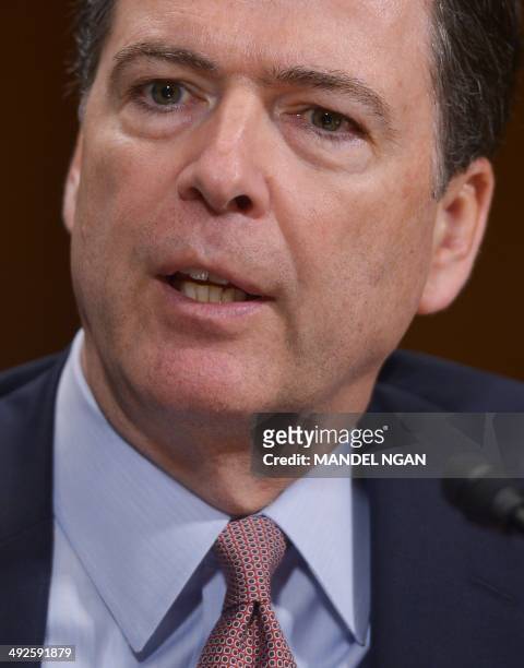Federal Bureau of Investigation Director James Comey testifies during a hearing of the Senate Judiciary Committee in the Dirksne Senate Office...