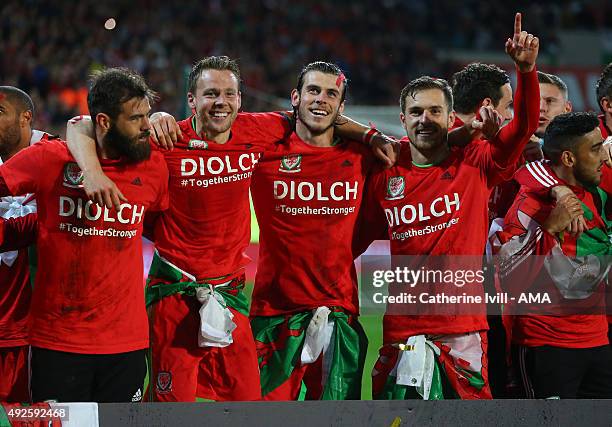 Gareth Bale of Wales celebrates alongside team mates Joe Ledley, Chris Gunter and Aaron Ramsey of Wales after the UEFA EURO 2016 Qualifier match...