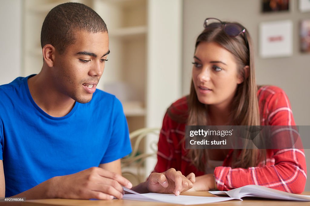 Two Make Homework Two Students Doing Homework High-Res Stock Photo - Getty Images