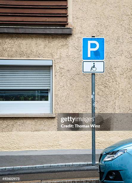 handicapped parking sign and car - parking sign stock pictures, royalty-free photos & images