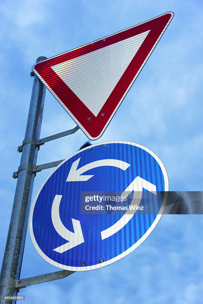 Traffic signs at roundabout