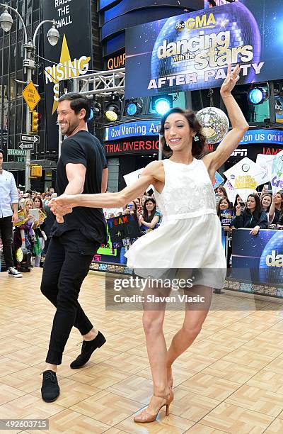 Dancing With The Stars" Season 18 winners Meryl Davis and Maksim Chmerkovskiy perform at ABC's "Good Morning America" at Times Square on May 21, 2014...