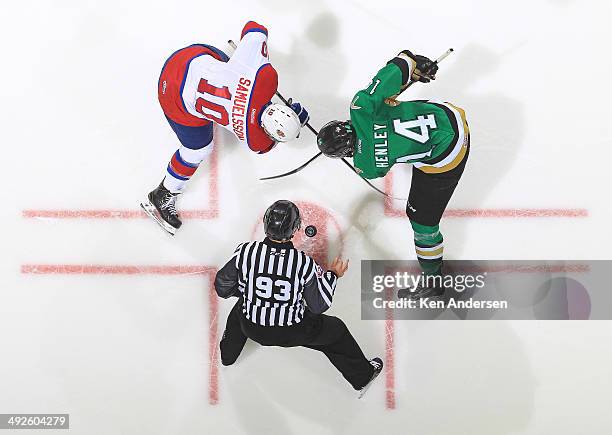 Samuel Henley of the Val'Dor Foreurs takes a faceoff against Henrik Samuelsson of the Edmonton Oil Kings during Game Five of the 2014 MasterCard...