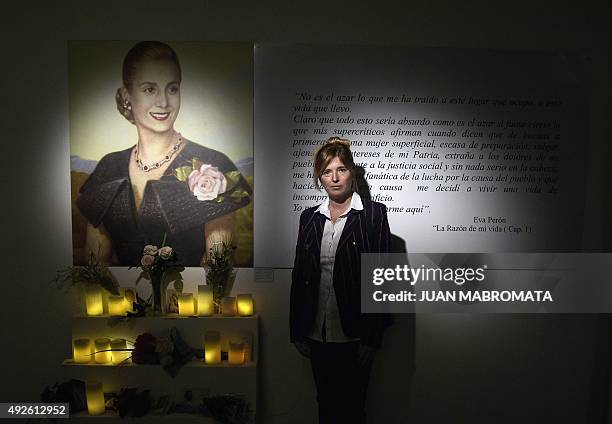 Buenos Aires Government Minister Cristina Alvarez Rodriguez, poses next to a portrait of her great-aunt, Argentine former First Lady Eva Peron ,...