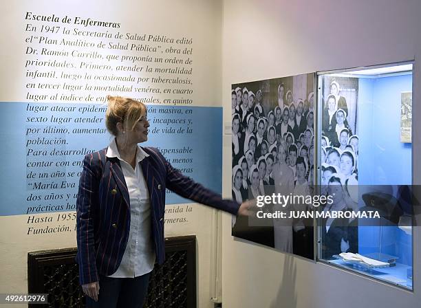 Buenos Aires Government Minister Cristina Alvarez Rodriguez, speaks during an interview as she points to her great-aunt, Argentine former First Lady...