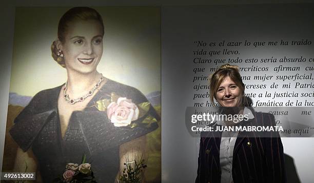 Buenos Aires Government Minister Cristina Alvarez Rodriguez, poses next to a portrait of her great-aunt, Argentine former First Lady Eva Peron ,...