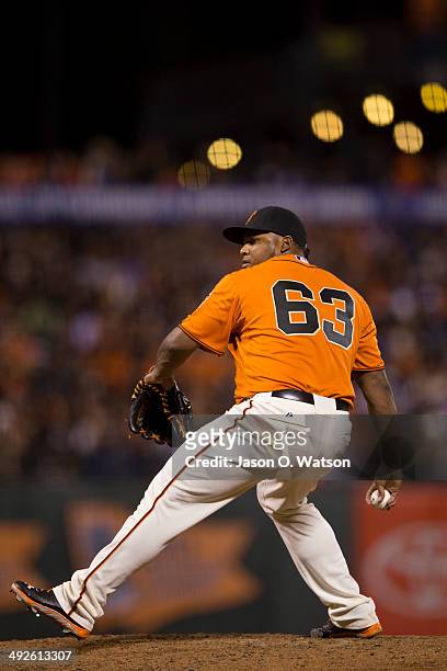 Jean Machi of the San Francisco Giants pitches against the Miami Marlins during the seventh inning at AT&T Park on May 16, 2014 in San Francisco,...
