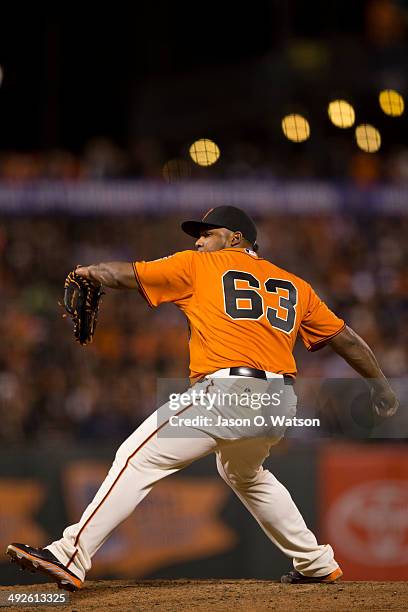 Jean Machi of the San Francisco Giants pitches against the Miami Marlins during the seventh inning at AT&T Park on May 16, 2014 in San Francisco,...