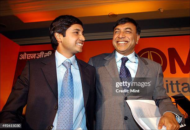 Chairman of Mittal Steel, Lakshmi N Mittal with his son Aditya Mittal at a press conference on July 7, 2006 in New Delhi, India.