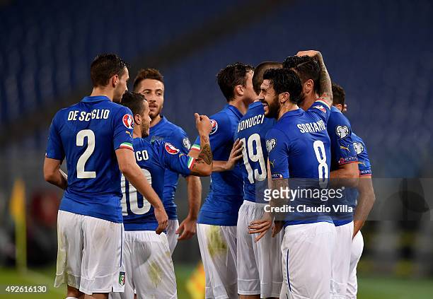 Graziano Pelle of Italy celebrates after scoring the second goal during the UEFA EURO 2016 Qualifier between Italy and Norway at Olimpico Stadium on...
