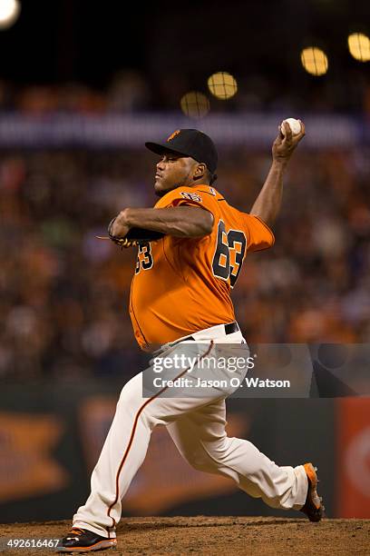 Jean Machi of the San Francisco Giants pitches against the Miami Marlins during the seventh inning at AT&T Park on May 16, 2014 in San Francisco,...