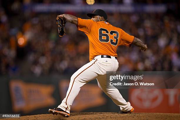 Jean Machi of the San Francisco Giants pitches against the Miami Marlins during the seventh inning at AT&T Park on May 16, 2014 in San Francisco,...