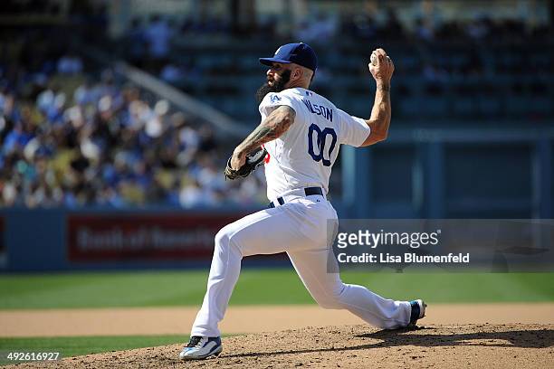Brian Wilson of the Los Angeles Dodgers pitches against the San Francisco Giants at Dodger Stadium on May 10, 2014 in Los Angeles, California.