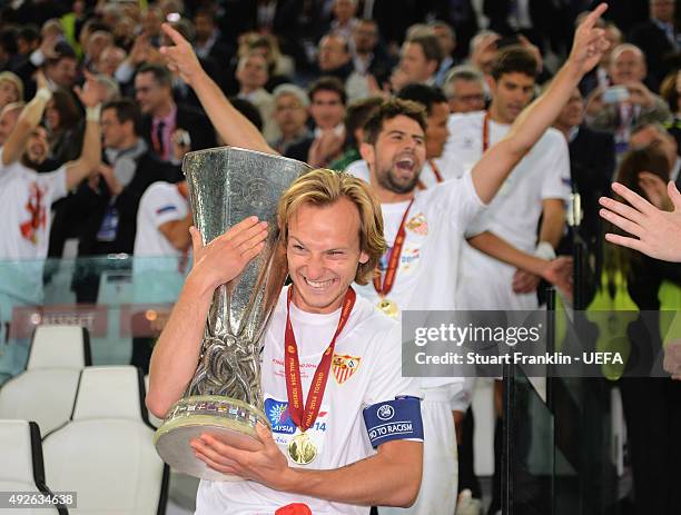 Ivan Rakitic of Sevilla celebrates with the trophy after the UEFA Europa League Final 2014 Between Sevilla FC and SL Benfica at Juventus Arena on May...