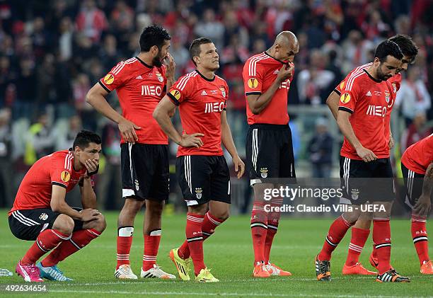 Dejected Benfica players look on during the penalty shoot out during the UEFA Europa League Final Between Sevilla FC and SL Benfica at Juventus Arena...