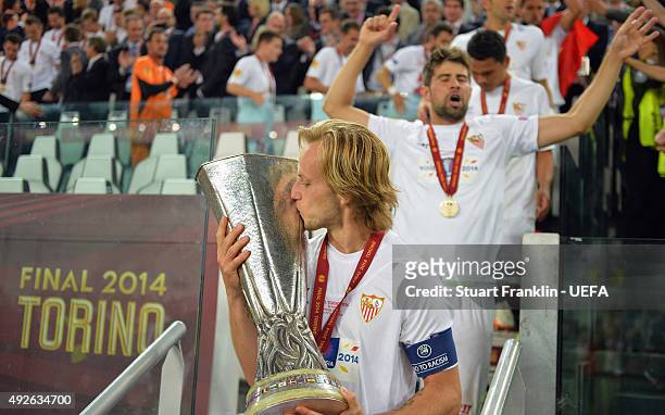 Ivan Rakitic of Sevilla kisses the trophy after the UEFA Europa League Final 2014 Between Sevilla FC and SL Benfica at Juventus Arena on May 14, 2014...