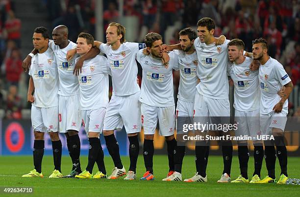 Sevilla players look on during the penalty shoot out during the UEFA Europa League final between Sevilla FC and SL Benfica at Juventus Arena on May...