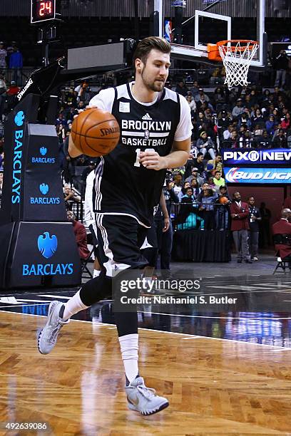 Sergey Karasev of the Brooklyn Nets dribbles the ball during the Open Practice on October 11, 2015 at Barclays Center in Brooklyn, NY. NOTE TO USER:...