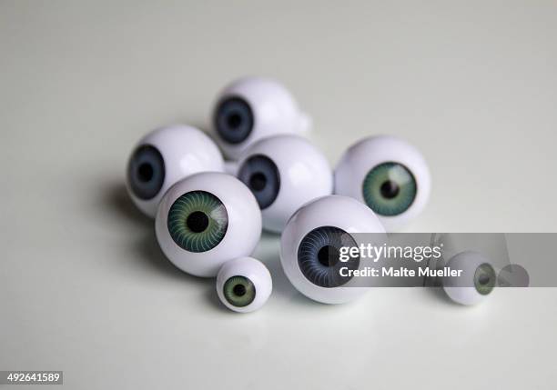 close-up of artificial eyeballs - bulbo oculare foto e immagini stock