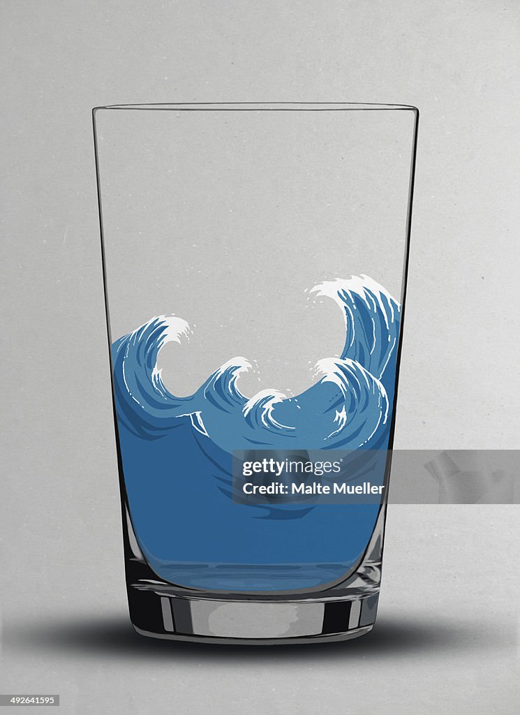 Illustration of choppy waves in a water glass