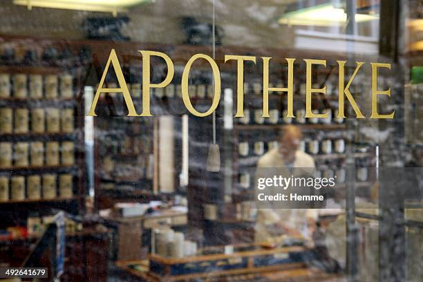 shop window of german pharmacy (apotheke) in schwabisch hall, baden-württemberg, germany - schwabisch hall stock pictures, royalty-free photos & images