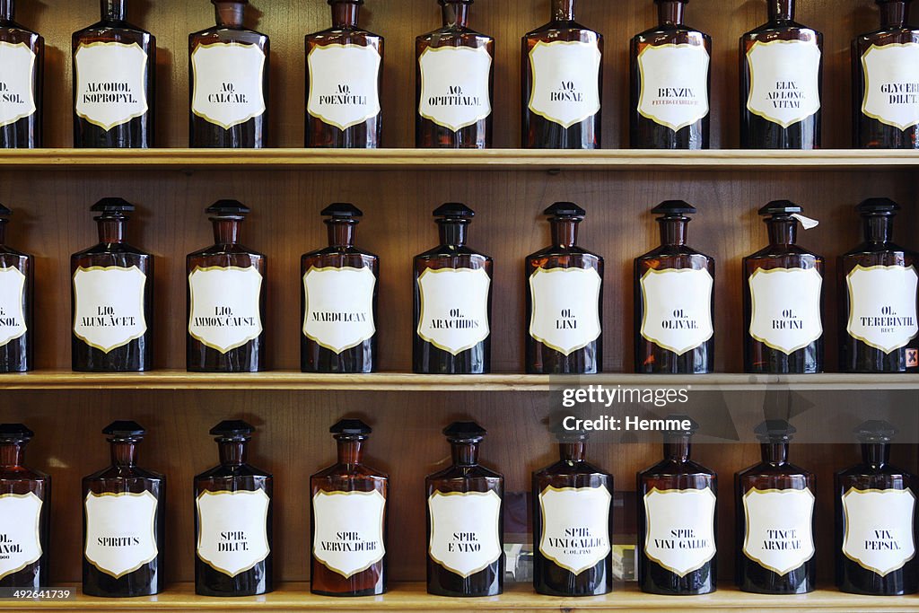 A range of natural spirits, acids and oils in homeopathic pharmacy